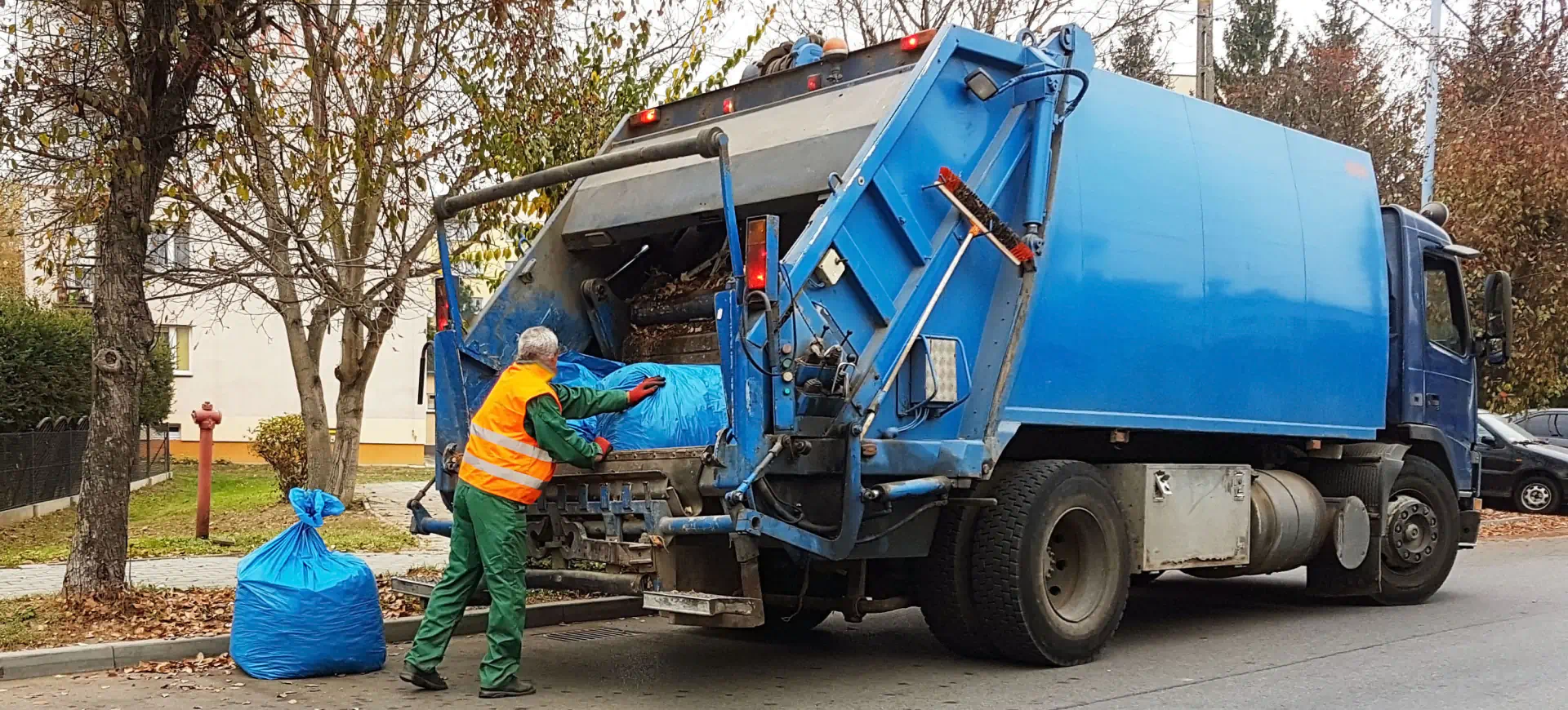 man collecting and removing junks